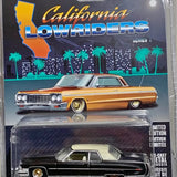 Orange 1973 Cadillac coupe diecast model car in blister packaging, front view