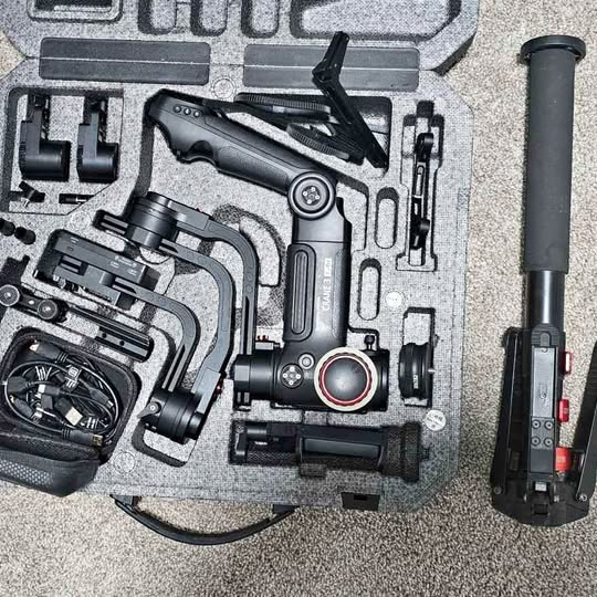 Drone gimbal and camera module in hard carrying case, black and gray