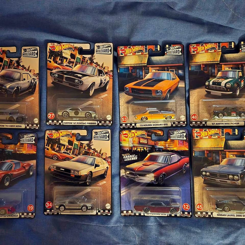 Assorted 1:64 diecast car blister packs with Hot Wheels-style vehicles
