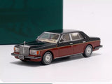 Diecast Rolls-Royce Silver Spur III 1994 red and black model car, front three-quarter
