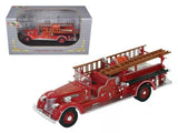 Red diecast fire engine truck model with extended ladder and side details