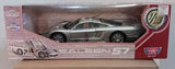 Silver diecast model sports car with black stripes in retail display box