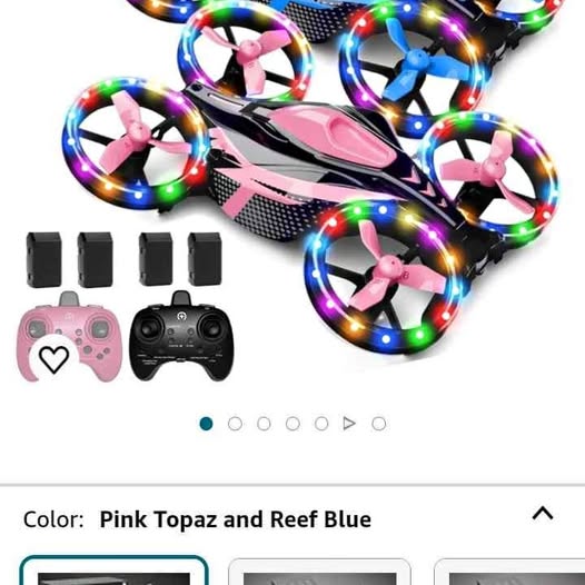 Pink and blue quadcopter toy drone with LED rings, two controllers and batteries
