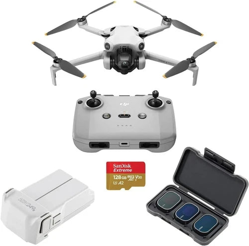 White DJI Mini 4 Pro drone with remote controller, batteries, and SD card