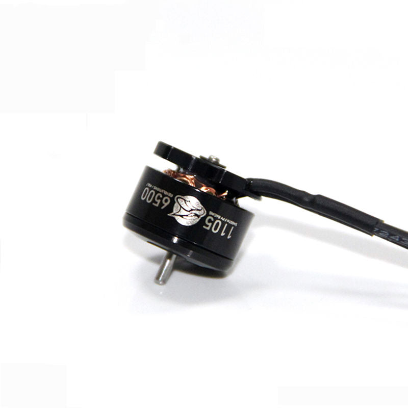 Black cylindrical DC motor with front shaft and white label