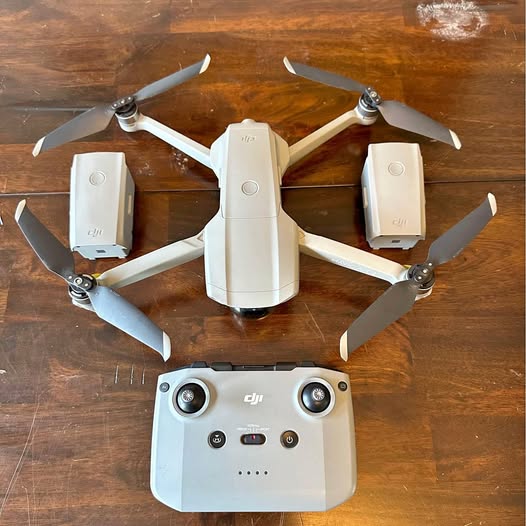 DJI Mavic Air 2 drone with four foldable propellers and white controller