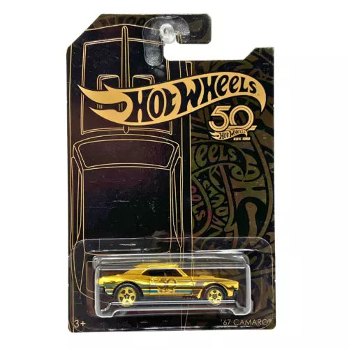 Black and gold 1967 Camaro 1:64 diecast toy in Hot Wheels blister pack