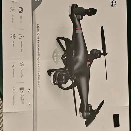 Black quadcopter drone with red accents and camera mount, shown front view.