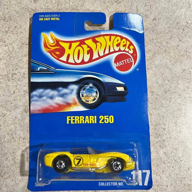 Yellow diecast race car with #7 decal, black wheels, in blister packaging