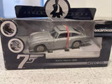 Silver Aston Martin DB5 diecast model car with red stripe, front view in box