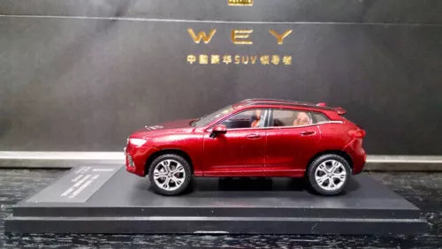 Red 1:43 WEY VV7 diecast model car, side view