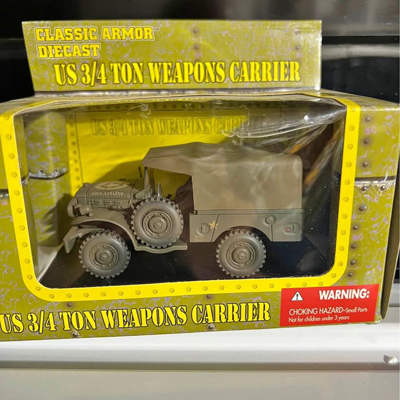 Diecast 3-1/4 ton weapons carrier toy, boxed with gray vehicle visible through window