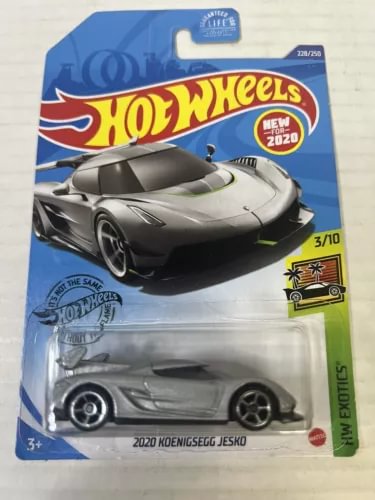 Diecast toy car in blister pack, dark gray with green accents