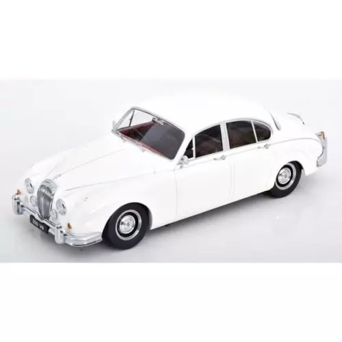 White classic diecast mini car with chrome front bumper and front three-quarter view
