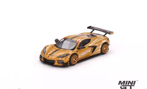 MINI GT diecast race car, yellow with star and stripe graphics, rear spoiler raised