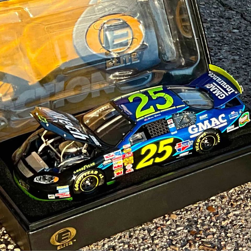 Black diecast race car with blue/yellow #25 decals and GMAC branding