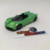 Green open-top roadster diecast model car with black front grille and wheels
