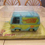 Diecast Mystery Machine toy van, turquoise and green with Scooby-Doo graphics.