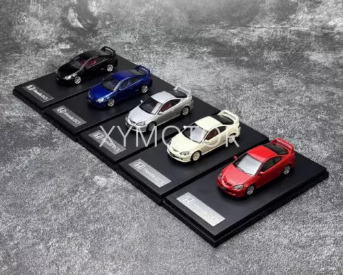 Diecast model car on display base, black, blue, white, red