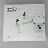 White folding quadcopter drone with camera, shown on product box