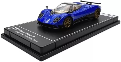 Blue 1:64 scale diecast model car on display base