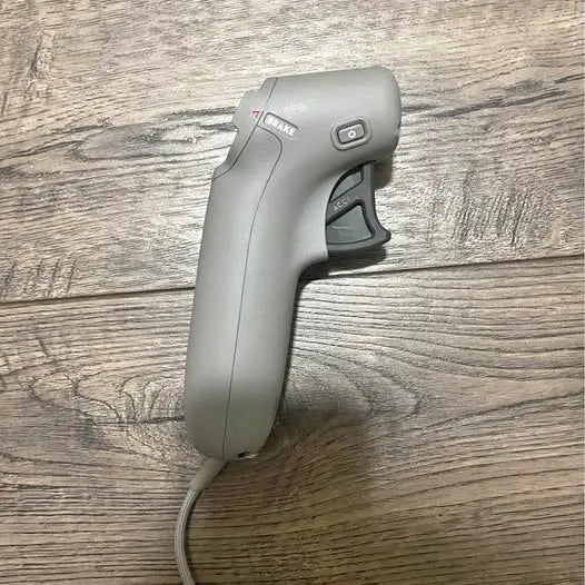 Handheld drone motion controller, grey shell with trigger and buttons