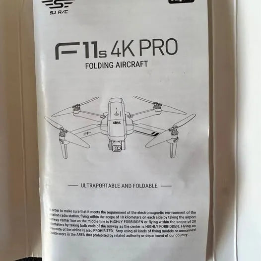 Folding 4K Pro drone box with top-down diagram and 4 propellers