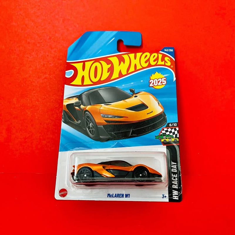 Hot Wheels McLaren W1 orange and black diecast car in blister pack, 2025