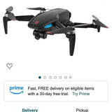 Racing FPV drone with black body, front camera, and four propellers