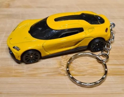 Yellow diecast model car keyring with chrome keyring loop