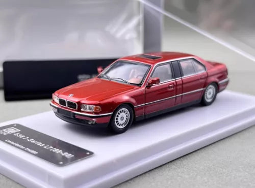 Red 1996-98 luxury sedan diecast model car with detailed chrome grille