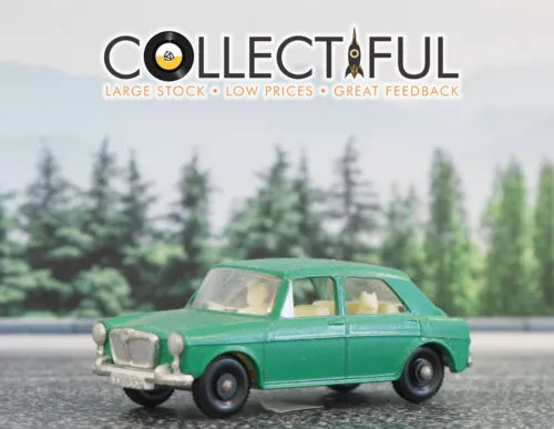 Green diecast classic car with black wheels, front three-quarter view.