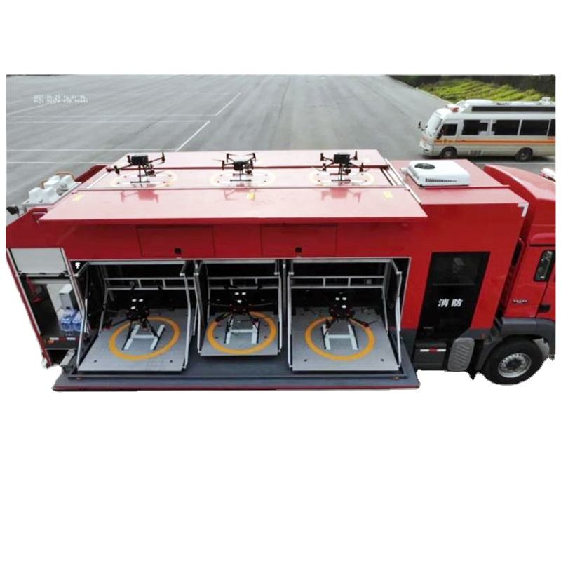 Red drone transport vehicle with open side cargo bay and three circular mounts