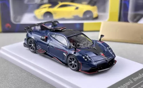 Blue diecast sports model car with black wheels and rear spoiler