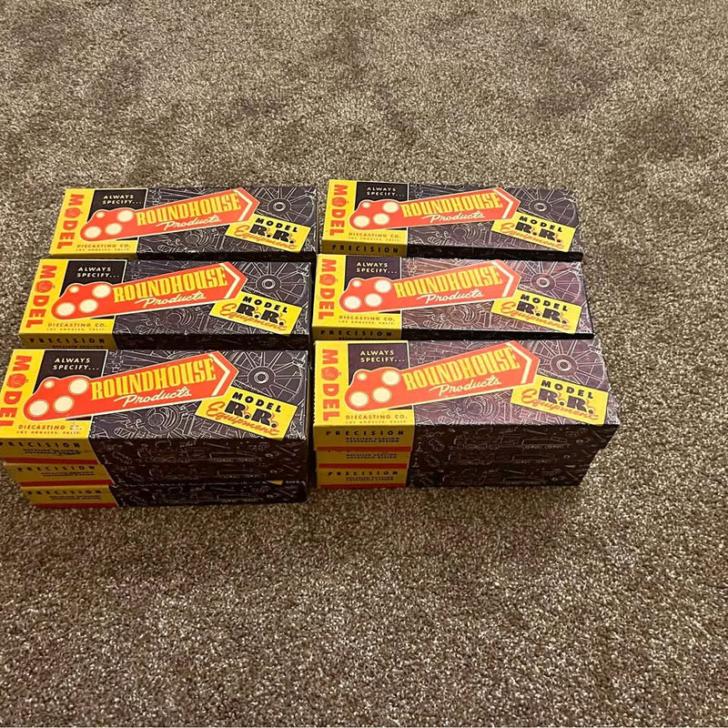 Vintage Roundhouse diecast toy train boxes, two packs, colorfully labeled