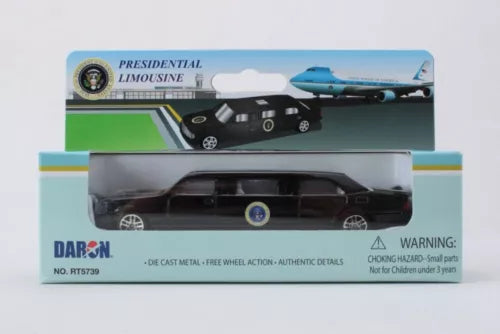 Black diecast presidential limousine toy with blue stripe, in retail box