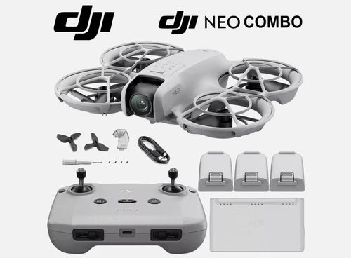 Gray quadcopter drone with remote controller and spare batteries, Fly More combo kit