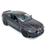 BMW M4 CSL 1:36 diecast toy car, matte black with orange racing stripes