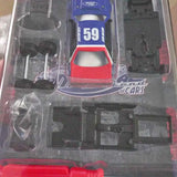 Diecast car custom kit with red body, blue hood, and numbered parts