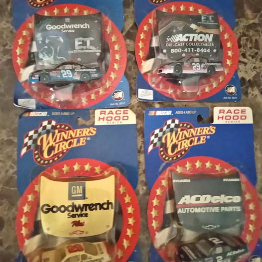 Diecast race car collectible in blister package with Goodwrench branding