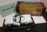 White 1:18 diecast road car model with open door and chrome details, on display base