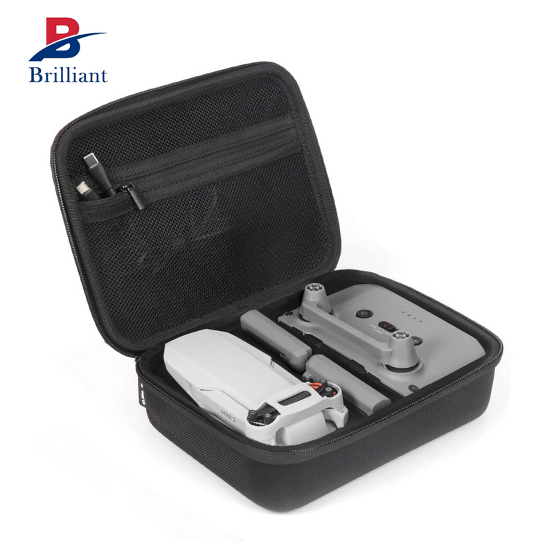 Black EVA hard shell drone carrying case, open with molded insert and strap