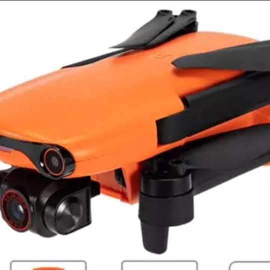 Orange and black nano mini drone with front camera and prop guards