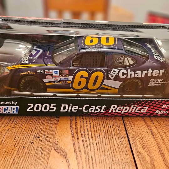 2005 die-cast replica car, #60 Charter, blue and orange racing livery
