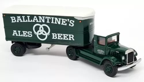 Green articulated diecast model truck with Ballantine's Beer branding and opening cab doors