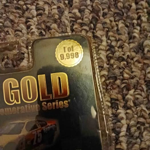 Diecast car package with GO! Gold logo and round price sticker