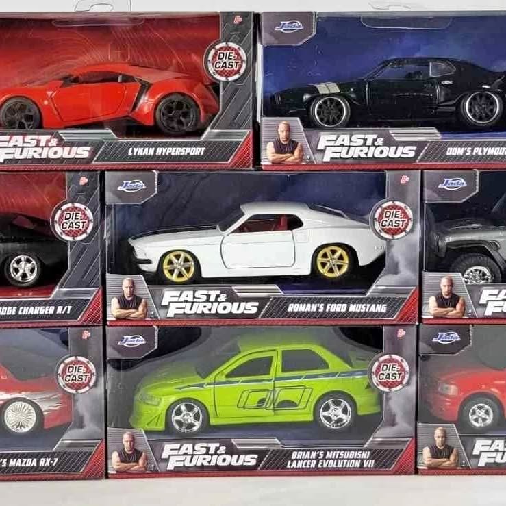 Lot of 8 diecast model cars, 1:32 scale, assorted boxed vehicles