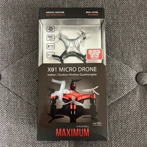 Micro drone quadrocopter product box showing red and white quadcopter