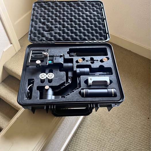Camera gimbal stabilizer kit in hard case with foam insert and mounted parts
