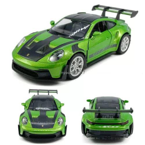 Green diecast model car with black hood stripes, front 3/4 view, fixed rear wing